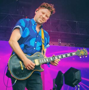 Whittaker performing live with The Midnight in 2023